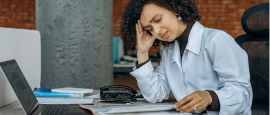Exhausted person at their workplace