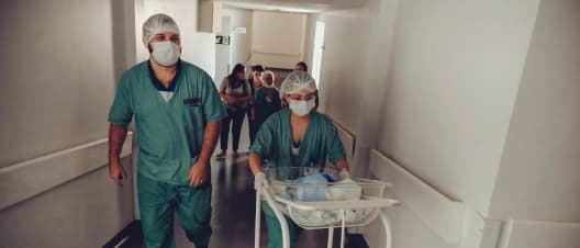 Healthcare staff in a hospital hallway